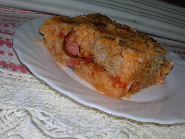 Сарту ( рисовый "пирог" со сборной мясной начинкой)